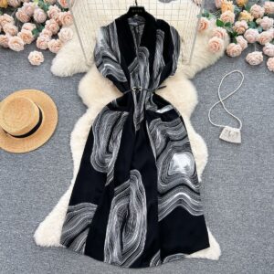 chiffon dress with a stunning black-and-white swirl pattern,