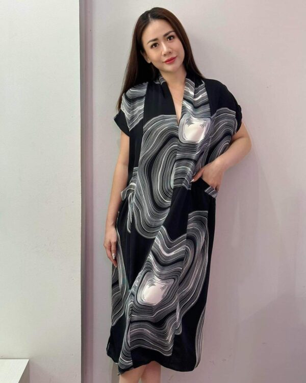 chiffon dress with a stunning black-and-white swirl pattern,